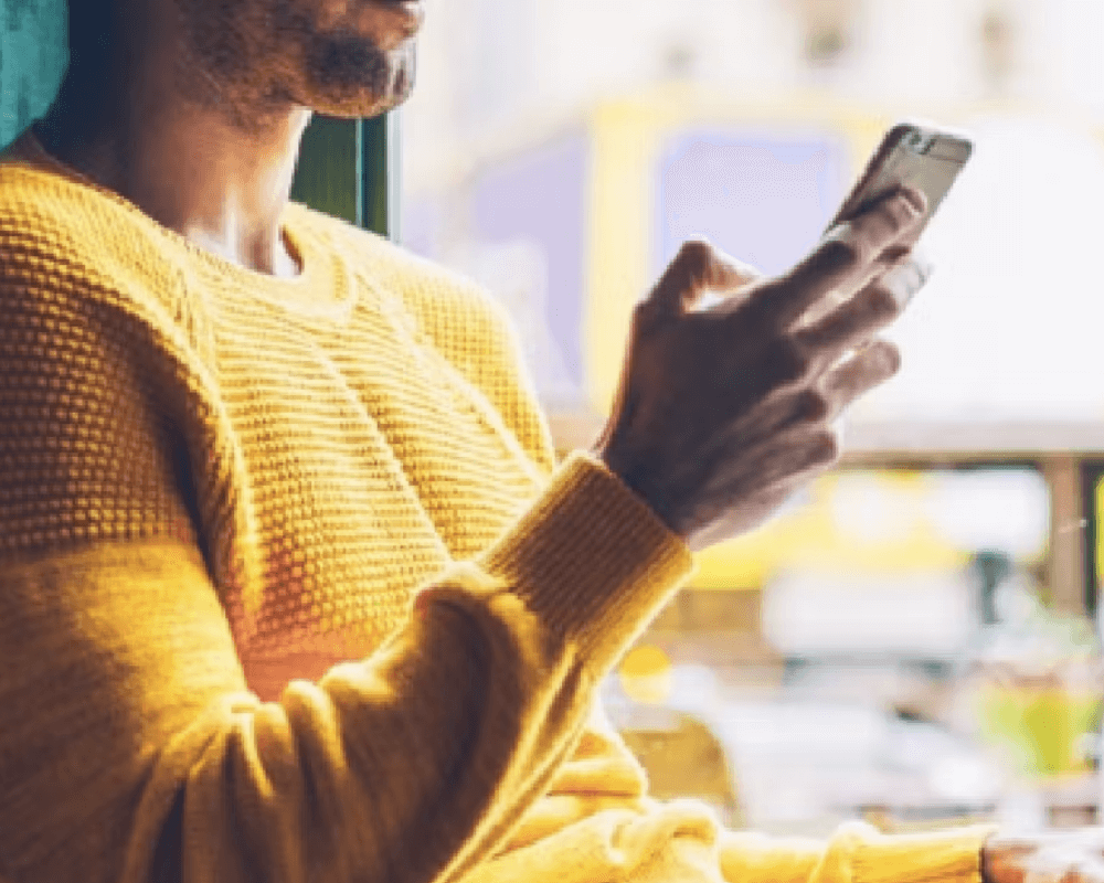 Man looking at his mobile phone