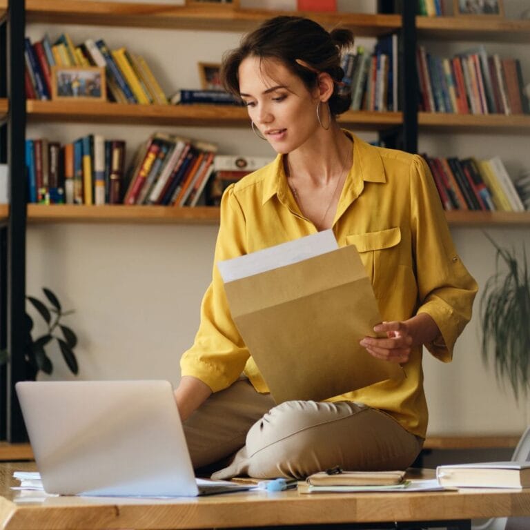 Woman looking at laptop