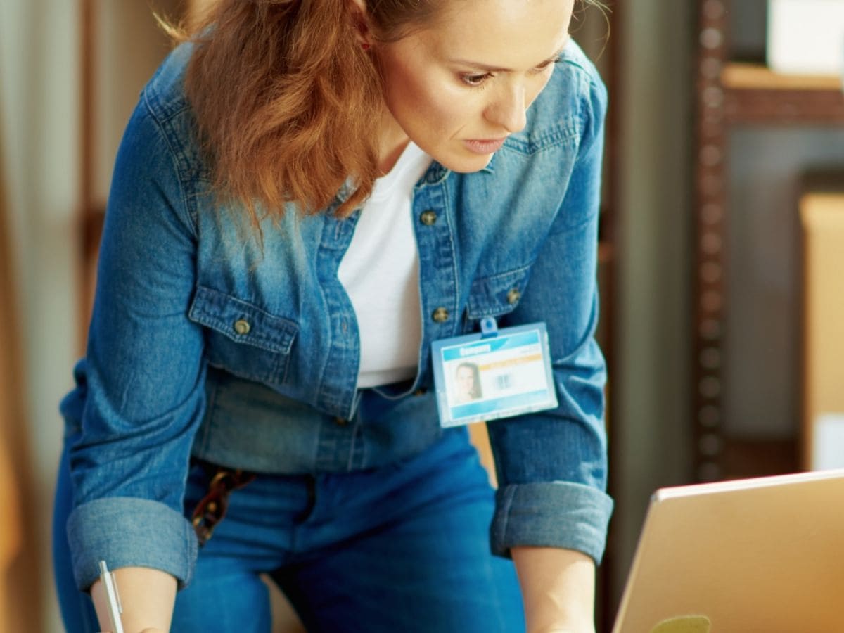 Woman looking at laptop