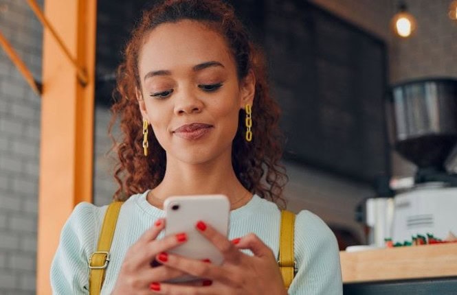 Woman looking at mobile device